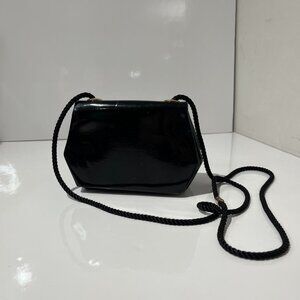 Vintage mini black purse with a glossy structured...